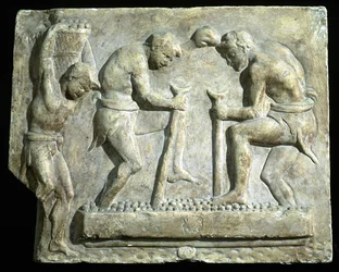Relief, das Pflasterer darstellt